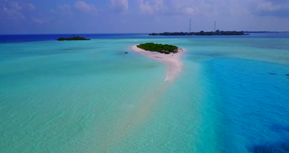 Luxury drone clean view of a white sand paradise beach and aqua blue water background in hi res 4K