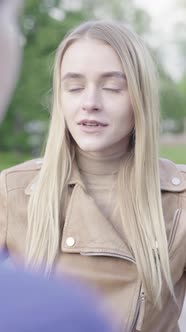 Vertical Video of a Young Skinny Girl in the Park