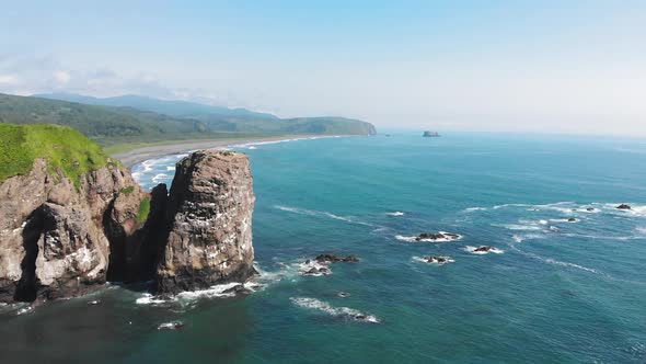 Halaktyr Beach. Kamchatka. Russian Federation. Dark Almost Black Color Sand Beach of Pacific Ocean.