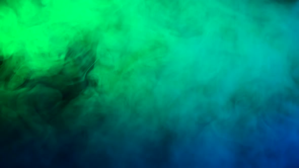 Abstract Green and Blue Smoke in Slow Motion