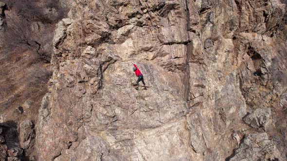 Rock Climbing Training on Steep Slope in Mountains