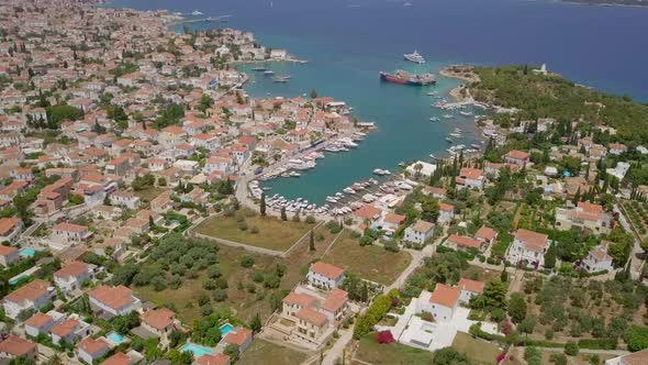 Aerial view of big boat harbor on bay at Nisi, Greece.