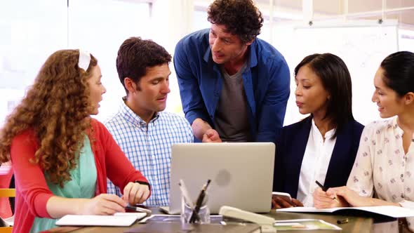 Group of business executives in a meeting