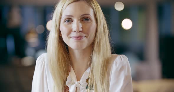 Blonde Woman Smiling to Camera Portrait