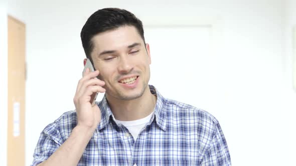 Man Busy with Phone Talk Negotiation on Mobile