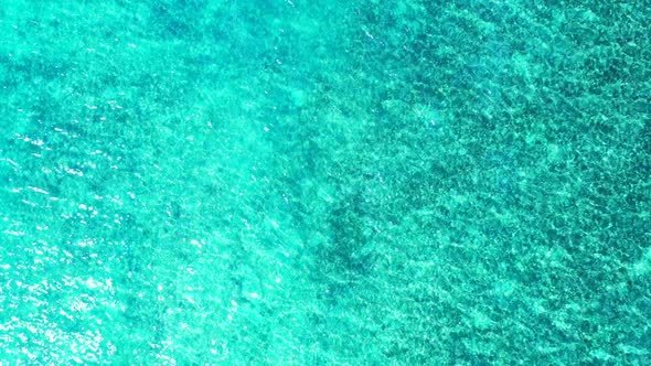 Aerial drone panorama of exotic tourist beach time by blue sea with clean sandy background of a dayo