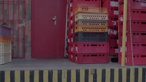 Backyard of Grocery Store with Food Crates