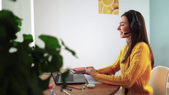 Girl Student Talking Online Via Webcam Using Video Call with Teacher