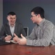 Men Making Agreement at Table in Office - VideoHive Item for Sale