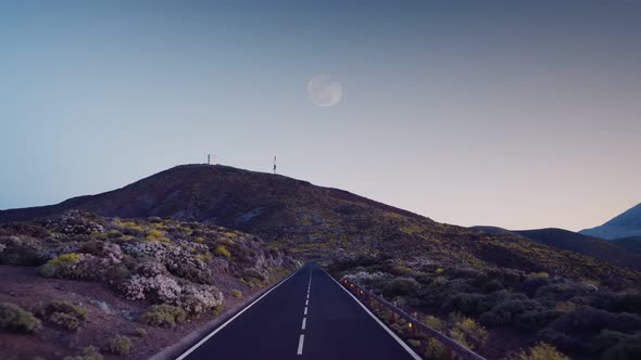 Road at Dusk Among the Frozen Volcanic Lava of the Volcano Teide Tenerife
