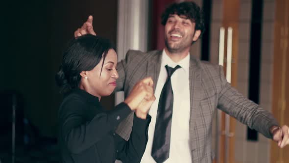 Men and Women Dance Happily at the Club