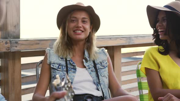 Young adult friends hanging out on a rooftop