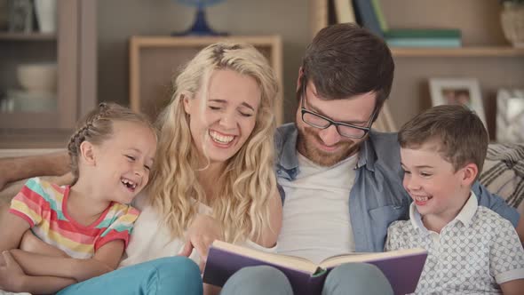 Family Reading a Book