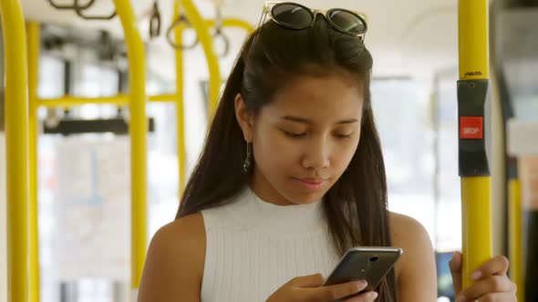 Teenage girl using mobile phone