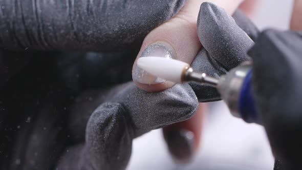 Closeup Slow Motion Shot of Hardware Manicure in a Beauty Salon