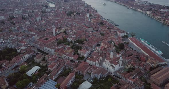 Wide aerial shot of Venice, San Marco from above at dusk