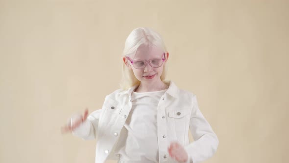 Portrait of Adorable Kid Girl Albino