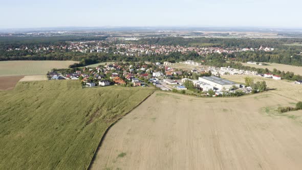 Aerial Drone Shot  a Town Surrounded By Fields in a Rural Area