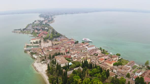 Aerial View of Historic Island of Sirmione in Lake Garda Italy Ancient Village in South of Lake