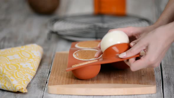 Chef Takes Away Frozen Mousse Cakes From Confectionery Form