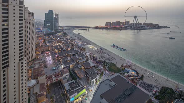 Waterfront Overview Jumeirah Beach Residence JBR Skyline Aerial Day to Night Timelapse with Yacht