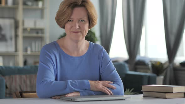 Yes, Positive Old Senior Woman Accepting Offer by Shaking Head at Work