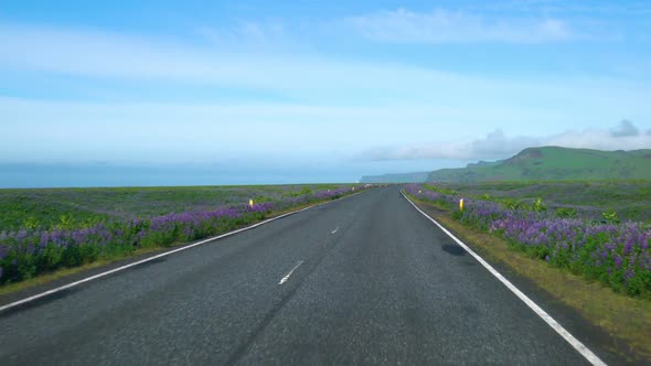 FPV of Car Driver POV Driving Along Countryside Road of Southern Iceland