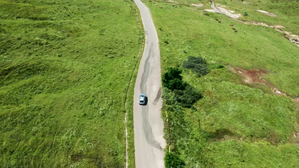 Top Down View of Car on Rural Road