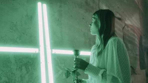 Beautiful Woman in an abandoned green Room