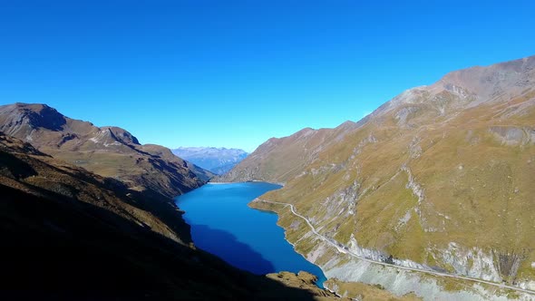 Moiry lake in the Swiss AlpsAerial shot with autumn colors