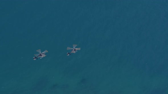 Aerial View of Helicopters Flying Over the Blue Ionian Sea in Greece