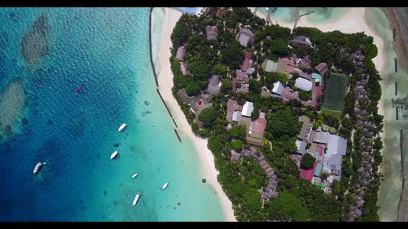 Aerial drone view travel of paradise coastline beach voyage by blue lagoon and white sand background