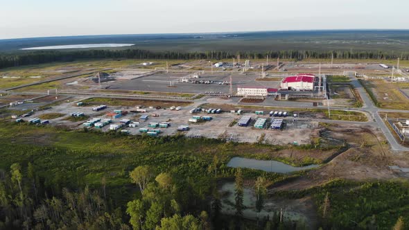 Drone Flight Over an Industrial Base Deep in Siberia, Around a Swamp and a Lake. Mining in the