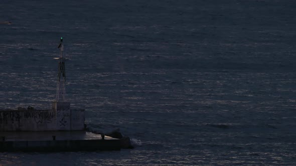 Schooner sailing in sea at night