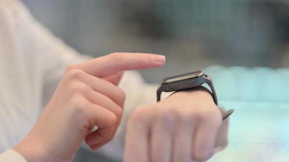 Woman Hands Using Smart Watch Close Up