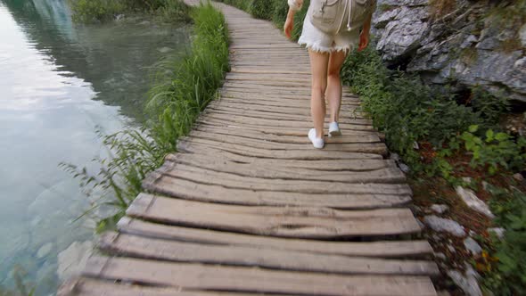 Young girl walking by Plitvice Lakes