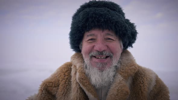 Closeup Portrait Happy Smiling Bearded Old Man in Hat Looking at Camera