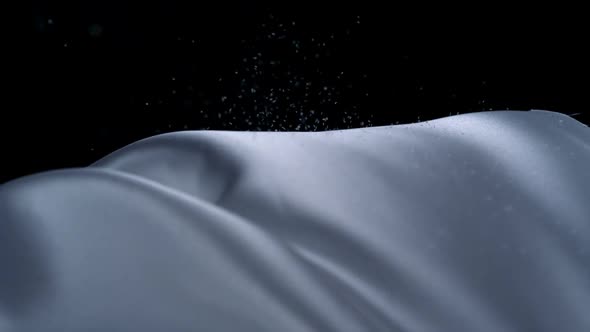 White fabric and rain, Slow Motion alt