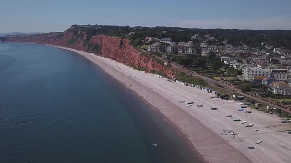 Aerial view of Budleigh Salterton beach with its red colored cliffs and its pebble beach. There are