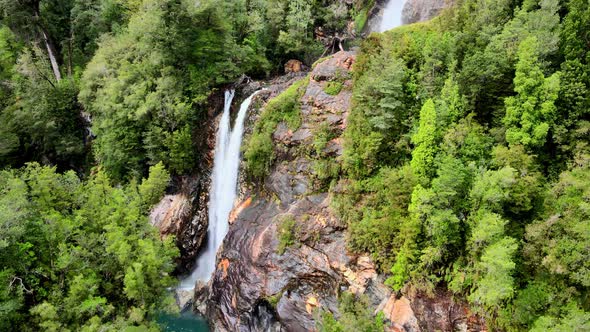 Aerial orbit of the Rio Blanco waterfall in Hornopiren National Park, Chile