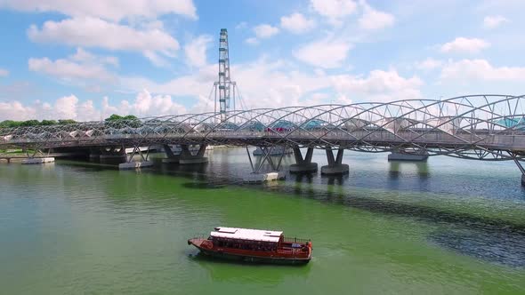 Aerial View of Helix Bridge, Singapore Flyer and Marina Bay. Singapore