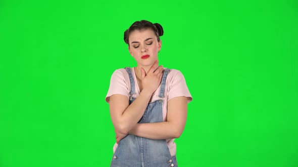 Girl Got a Cold, Sore Throat and Head, Cough on Green Screen at Studio