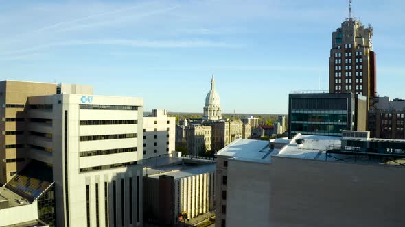 4k drone video of the state capital in Lansing, Michigan as the sun rises