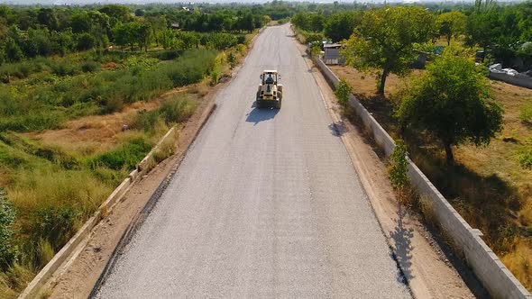 Construction of the road from a height. Work asphalt