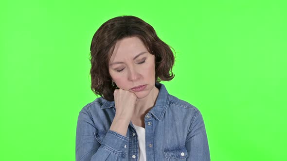 Tired Old Woman Taking Nap on Green Chroma Key Background