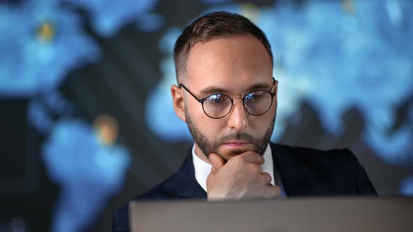 Business Male in Suit Working Laptop Analyzing Corporate Stock Exchange Information Hi Tech Office