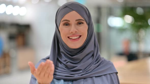 Cheerful Arab Woman Talking on Video Call