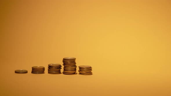 Rows of Money Coins on Gold Background