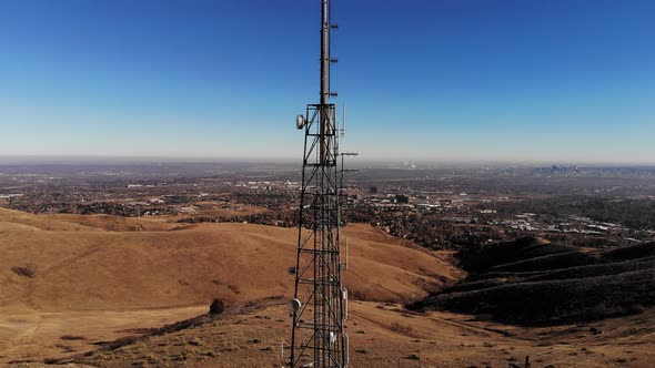 A rising shot capturing a towering cell tower