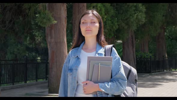 Young Student Girl Standing Outside